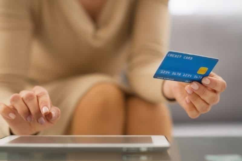 how do credit card companies make money